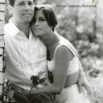 A black and white image of a man and a woman hugging and looking at the viewer. The title/words "Me & Issy" are written at the top in green and the words "A Four Seasons Romance" are below in black.