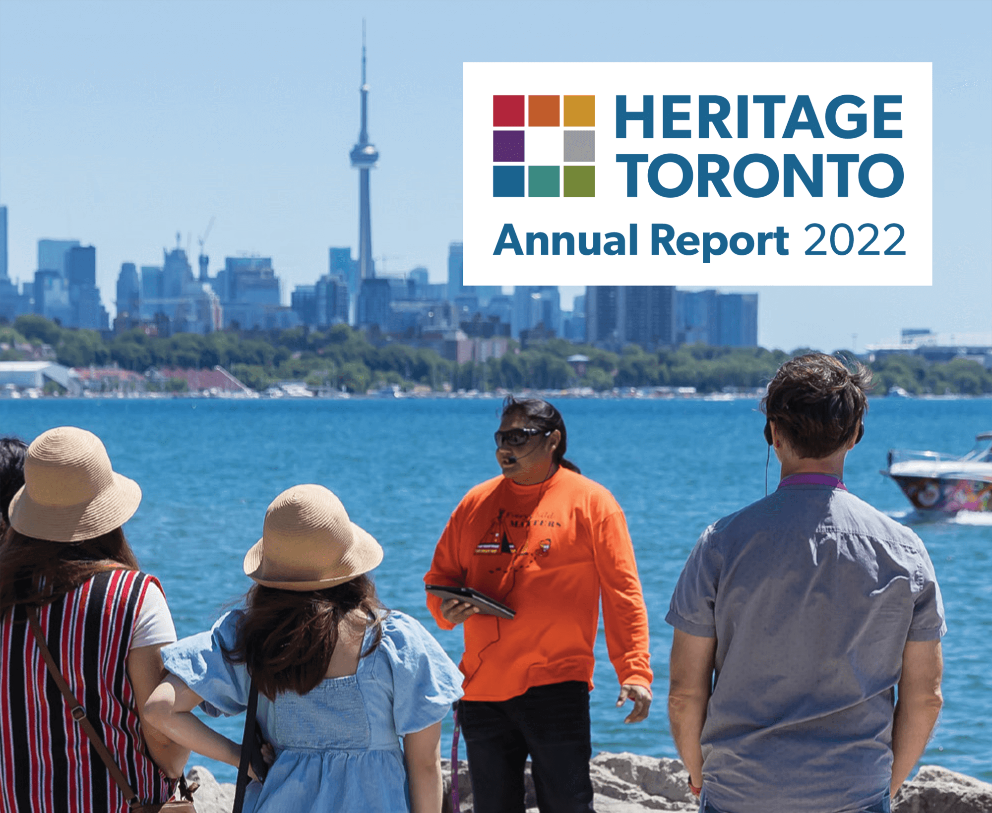 Graphic showing image of people in foreground and cityscape behind large lake with title Heritage Toronto Annual Report 2022