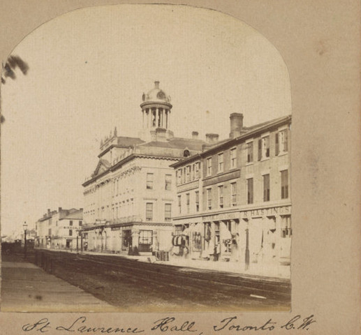 Two similar views of a street with a landmark three-storey building on it. The building features a large cupola on top.