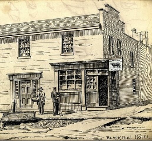 A pen illustration on yellowish paper of a two-storey building with a sign out front labelling it "The Black Bull Hotel." Two men stand in front of the building's two doors. In the bottom right of the illustration is the handwritten label "Black Bull Hotel."