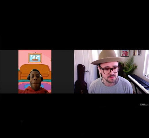 Two men can be seen in the frame, on a video call, both framed in black. The man on the left has a colourful cartoon background. He wears headphones. The man on the right wears glasses and a hat. In the background is a keyboard and guitar.