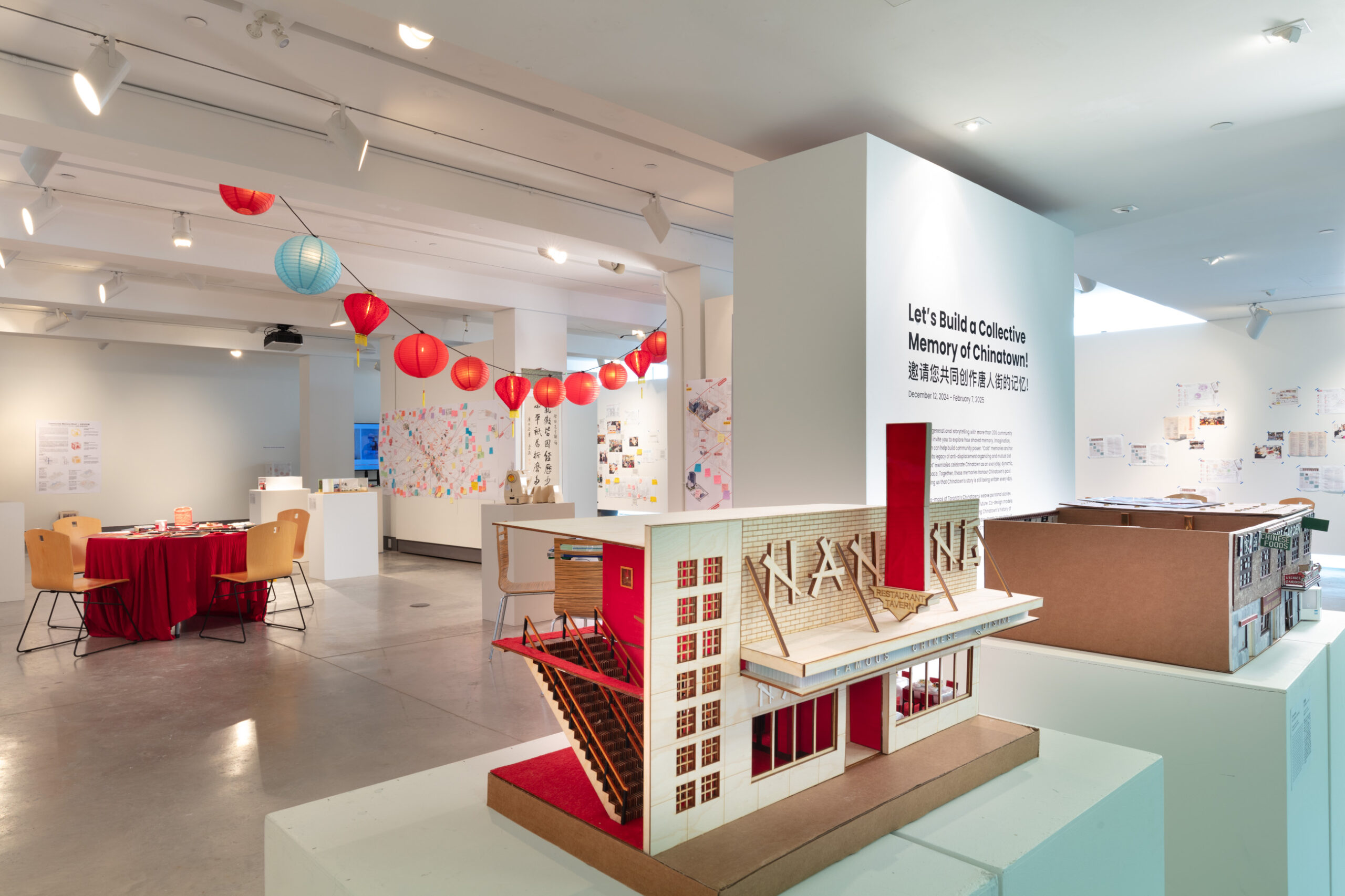 An exhibit space featuring various types of artwork relating to Toronto's Chinatown.