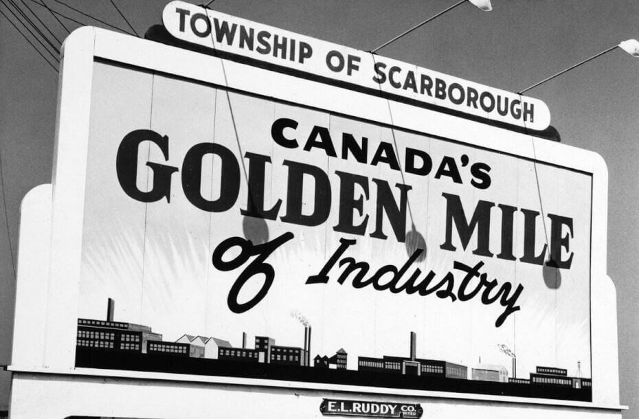 Black and white photo of a billboard sign that says, 