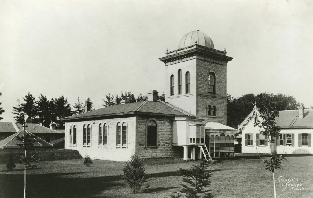 A black and white image of an astronomical observatory.