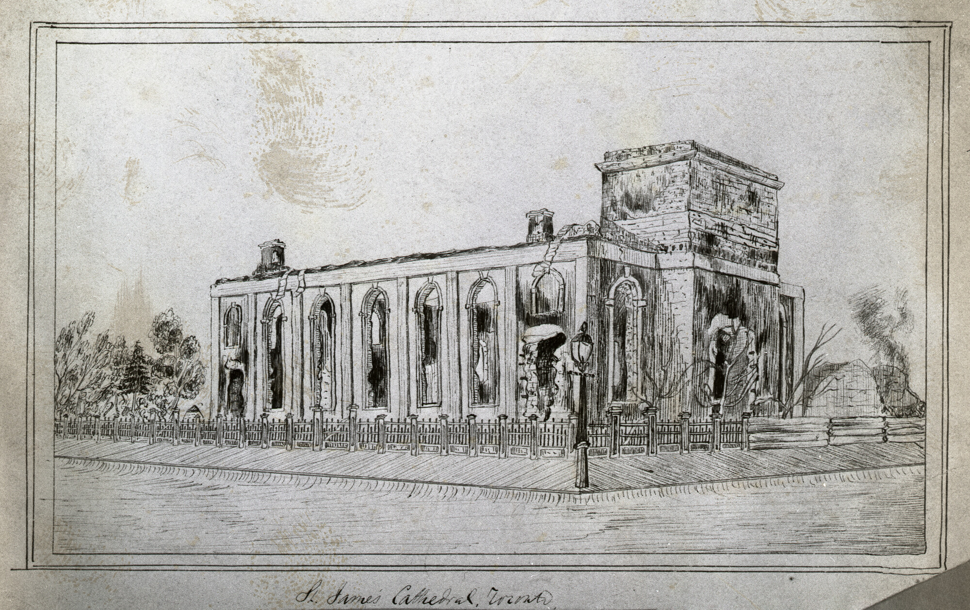 A black and white sketch drawing of the scorched remains of a church after a fire. The buildings windows are broken and there are char marks on the exterior of the structure.
